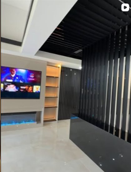 NKN Home Creations Instagram reel of a dark slatted feature wall