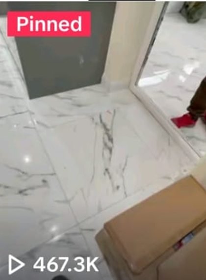 NKN Home Creations TikTok video of a marble tiled floor installation