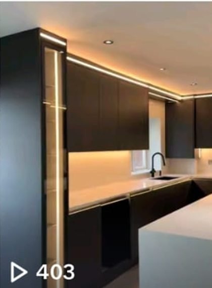NKN Home Creations TikTok video of a dark handleless kitchen