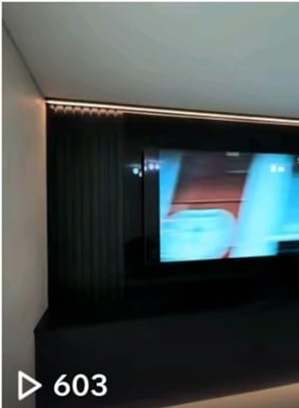 NKN Home Creations TikTok video of a slatted media wall